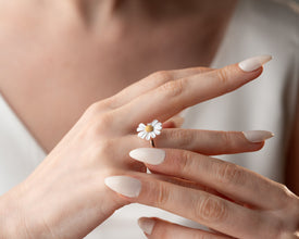 Daisy ring with 'Loves Me Not' etching styled with wildflowers and vintage book