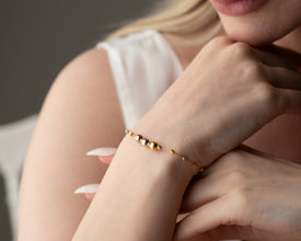 Self-care morning routine with coffee and bracelet