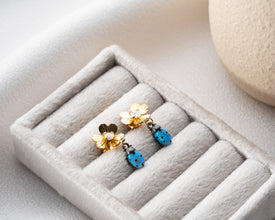 Shimmering sterling silver finish on Blue Ladybug Earrings