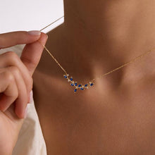 Gift-ready box open revealing gold-plated 925 sterling silver blue marquise vine necklace.