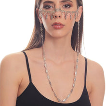 Close-up of antique silver nose and face chain jewelry with intricate detailing and adjustable press fit design.
