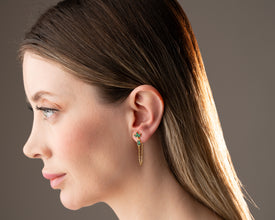 Boho bride getting ready with lotus earrings as spiritual wedding jewelry