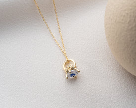 Handcrafted cosmic jewelry with an Evil Eye motif, ideal for those who embrace astrology and celestial themes.