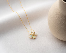 Gift-ready sterling silver necklace with a blooming opal flower pendant, perfect for birthdays and special occasions.