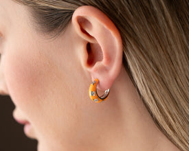 Delicate hoop earrings with cosmic inspiration and handcrafted details