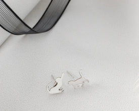Hypoallergenic silver earrings for cat lovers, lightweight and dainty.