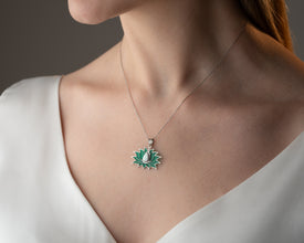 A luminous opal bloom pendant capturing celestial light and natural beauty.