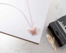 Stylish filigree butterfly pendant in silver with dazzling cubic zirconia