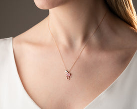 Styled outfit with dainty cat-themed heart necklace