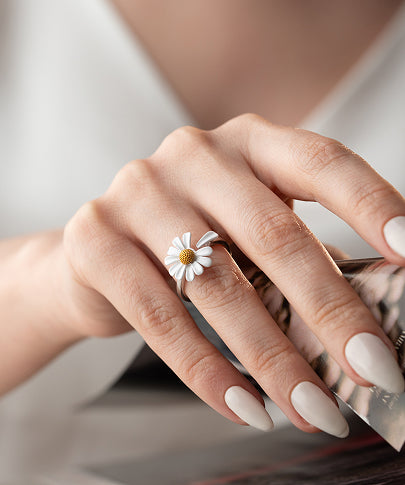Sterling silver daisy ring with adjustable band, inspired by ‘Loves Me Not’ — a romantic floral jewelry gift for her, bridesmaids, or self-love moments.