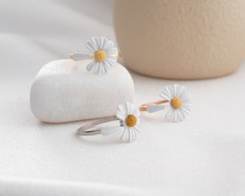 How to layer dainty daisy ring with other stackable jewelry