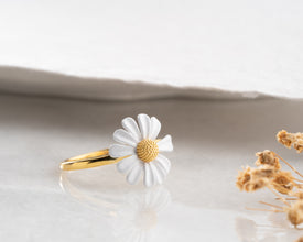 Minimalist jewelry collection built around daisy ring