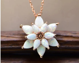 Handmade sterling silver lotus flower necklace, a minimalist and elegant spiritual jewelry piece.