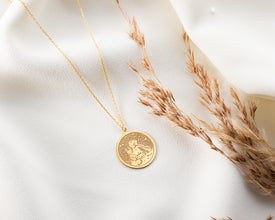 Minimalist sterling silver pendant featuring The Little Prince, ideal for book lovers.