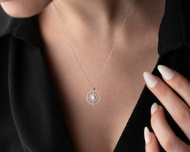 Unique golden sunbeam charm necklace, a perfect statement piece for astrology and celestial lovers.