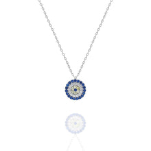 Necklace with a blue and clear gemstone pendant on a white background