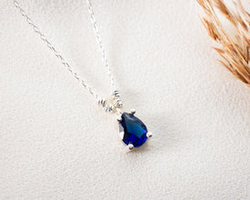 September birthstone necklace with a delicate and modern minimalist design.