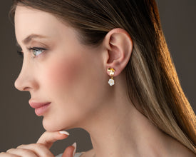 Evening ambiance: earrings catching candlelight