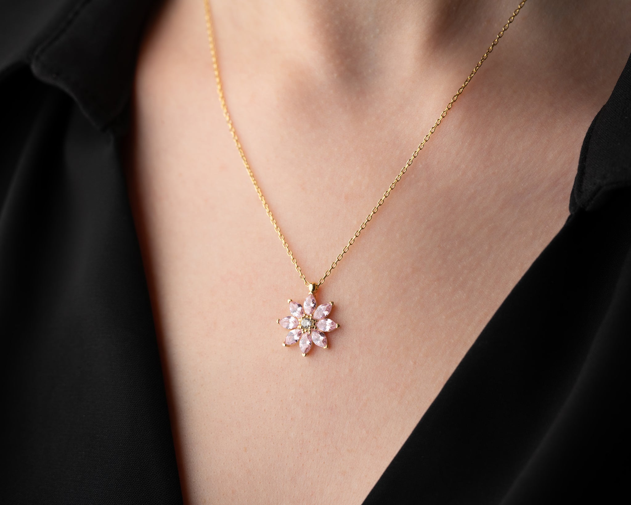 Elegant nature-inspired floral necklace, handcrafted with intricate magnolia petal details in silver.