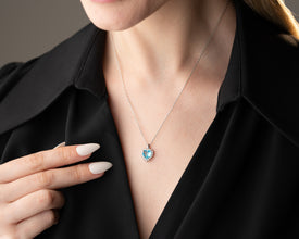 March birthstone necklace featuring a radiant aquamarine gemstone in silver.