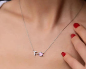 Handmade Sterling Silver Tulip Necklace featuring a shimmering pink tourmaline gemstone.