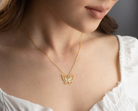 Nature-inspired butterfly necklace with cubic zirconia details in silver