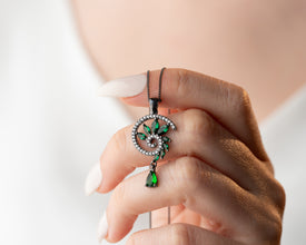 Black wedding veil styled with ominous birthstone jewelry