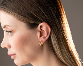 Premium gift presentation: gold hoops in suede box with satin ribbon