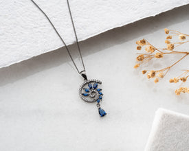 Gothic Yule gift flatlay with dried winter berries and velvet