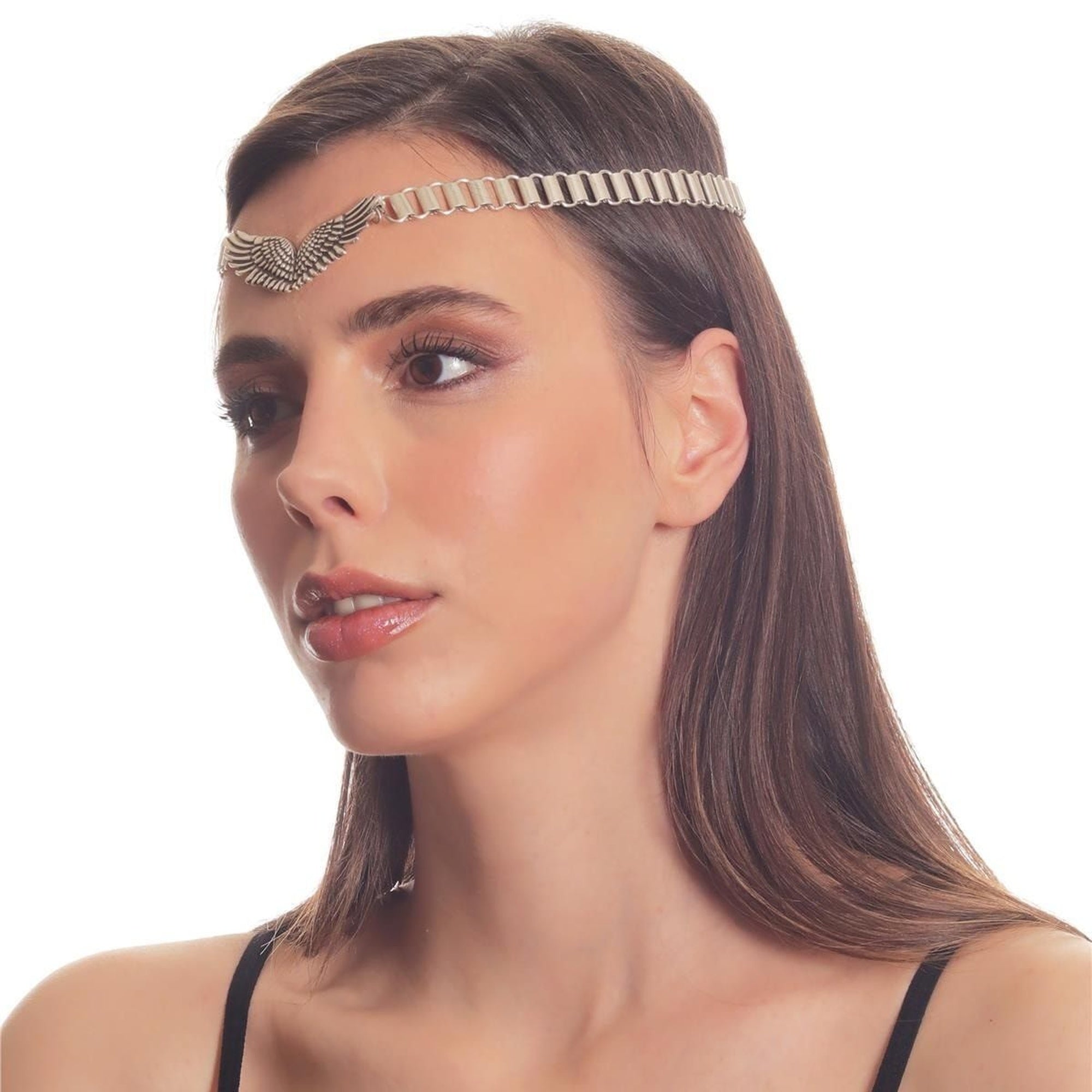 Woman wearing a decorative headband on a white background
