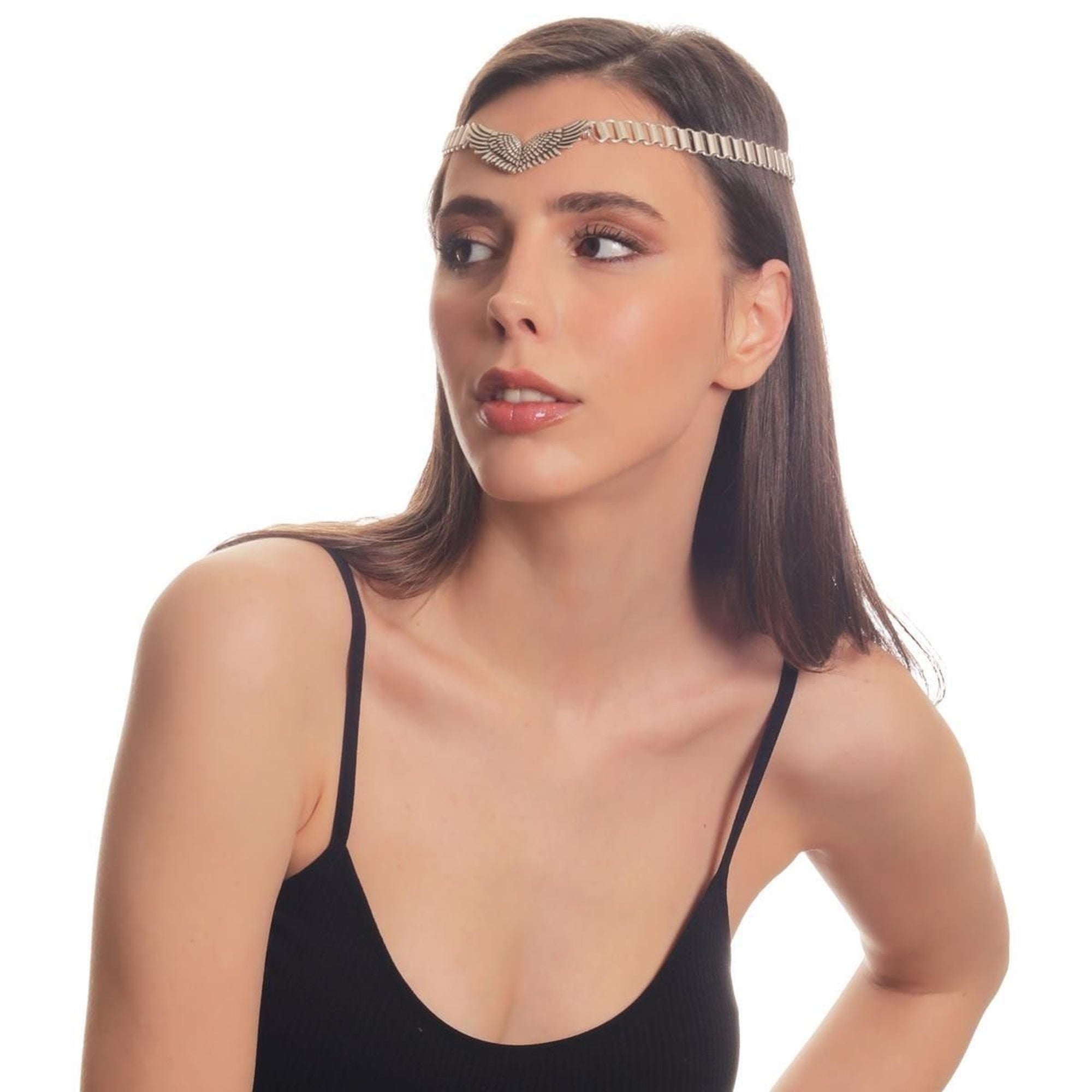 Woman wearing a decorative headband on a white background