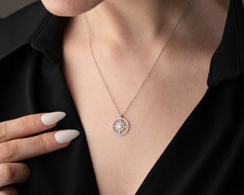 Elegant gold-plated sun necklace designed as a symbolic piece of warmth, light, and energy.