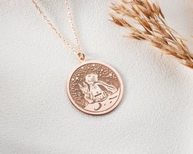 Adjustable silver chain necklace with a meaningful The Little Prince charm.