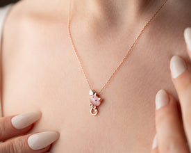 Minimalist cat necklace styled with casual outfit