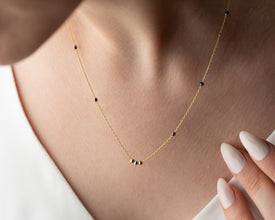 Elegant black bead necklace for capsule wardrobes