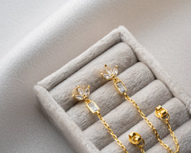 Full moon ceremony featuring women wearing lotus chain jewelry