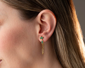 Macro shot of clear quartz crystals in gold lotus settings