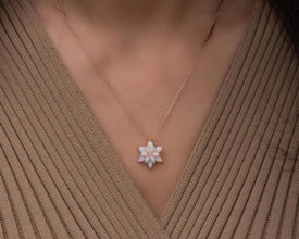 Minimalist lotus flower necklace handcrafted in silver, a perfect mindfulness gift for women.