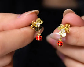 Cute and whimsical ladybug earrings, a lucky charm jewelry piece for women.
