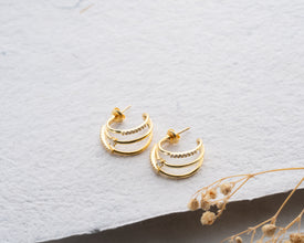 Day-to-night styling: CZ hoop earrings with blazer and evening clutch