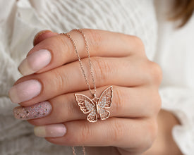 Elegant butterfly pendant necklace with filigree design in sterling silver