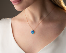Elegant blue opal necklace with lotus flower design, spiritual gift