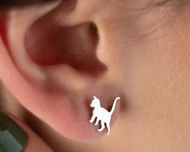 Small sterling silver cat studs, ideal for everyday wear.