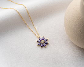 Minimalist gemstone floral necklace, perfect for layering and elegant styling.