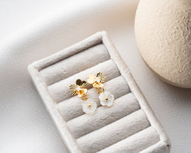 Power styling: floral drop earrings with tailored blazer