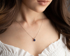 Luxury handmade sapphire jewelry piece in oval cut.