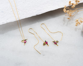 elegant-hummingbird-jewelry-on-white-background