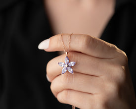 Handmade lavender bloom silver flower pendant necklace, a delicate nature-inspired jewelry piece.