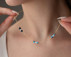 Minimalist necklace worn with casual outfit