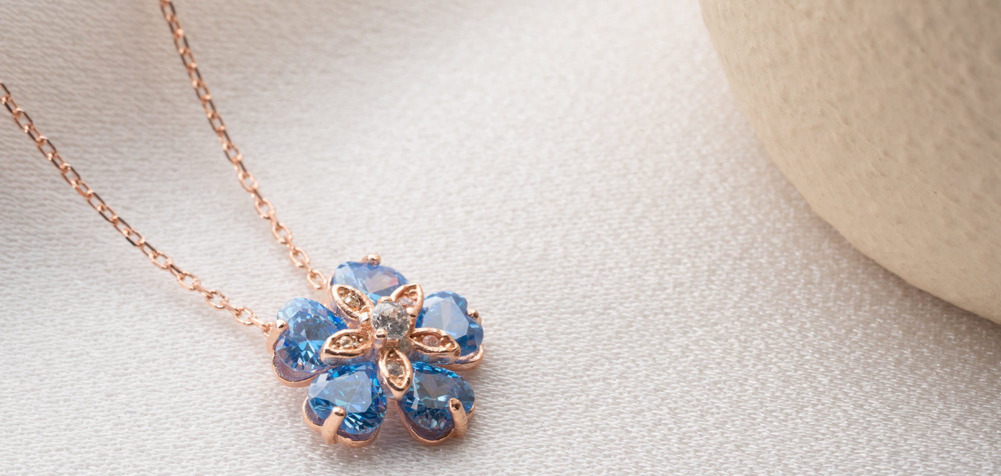 Sterling silver ocean flower pendant necklace, a minimalist boho charm inspired by nature — perfect beach lover’s gift for women who adore coastal style.